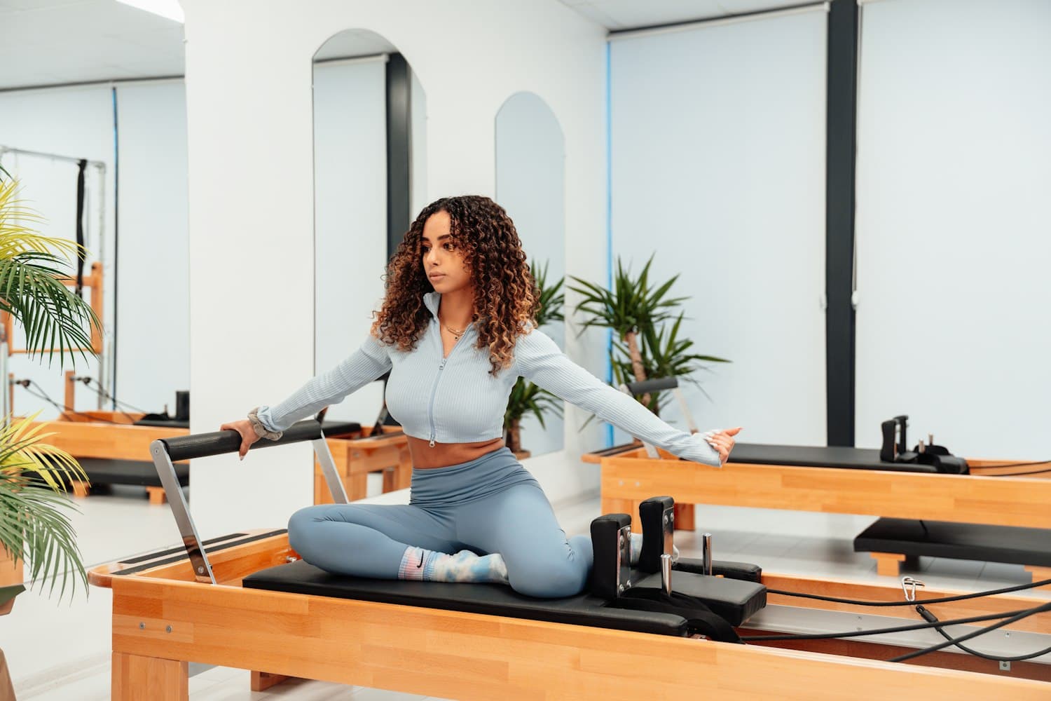 Reformer 50 reformer Pilates class at the studio